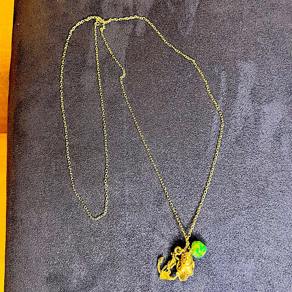 Silver necklace with turquoise, anchor & skull